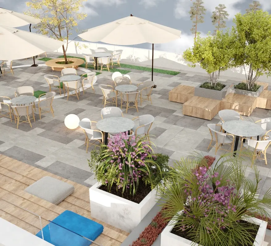 Outdoor office café seating design with terrace furniture, umbrellas, landscaped planters, and relaxing employee outdoor dining area.
