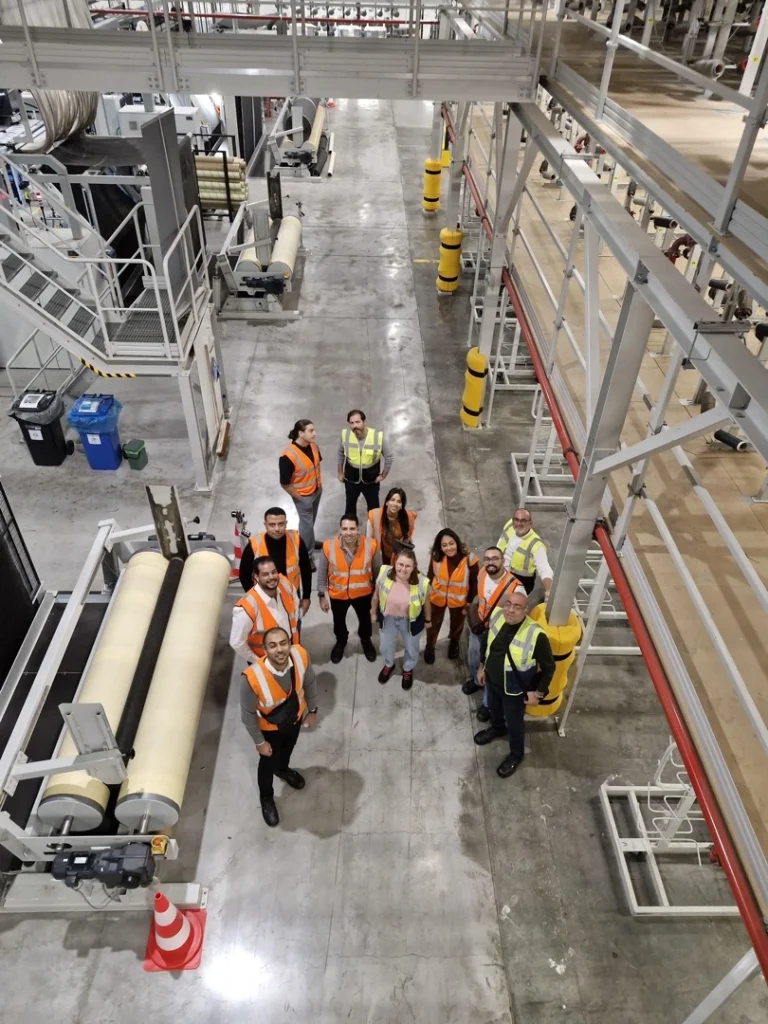 Group of international design and sustainability leaders during the Belgium Innovation Tour, collaborating with the Swedish Group, exchanging ideas on future design, sustainable manufacturing, and innovation, symbolizing inspiration and global partnership.